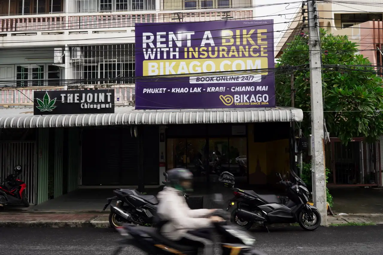 Bikago Chiang Mai fleet parked outside their Chiang Mai location, showing a selection of their well-maintained scooters available for rental